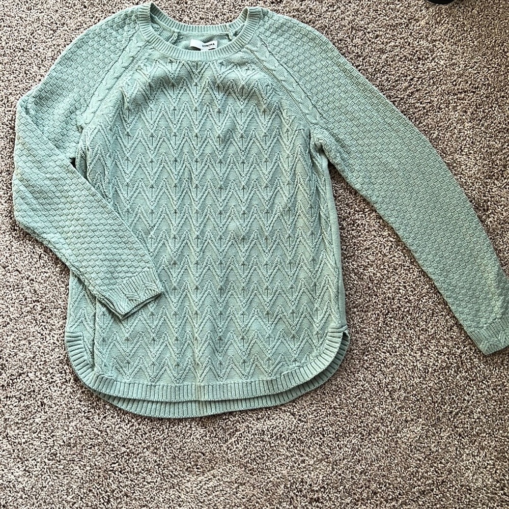 Teal woman’s top